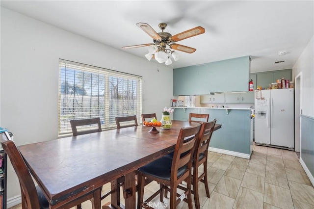 dining area featuring visible vents and ceiling fan