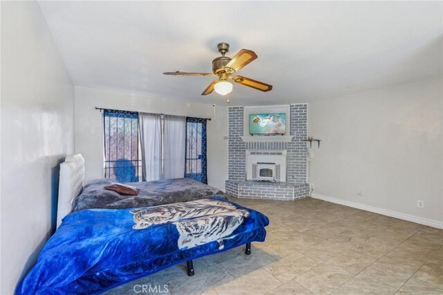 bedroom featuring baseboards and ceiling fan