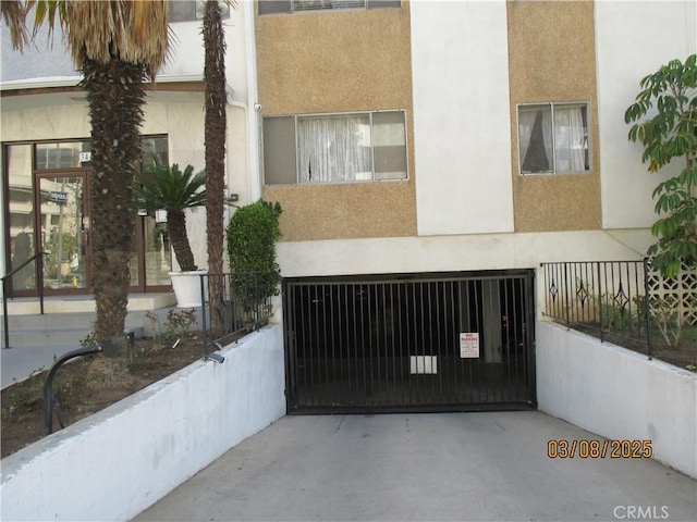 view of gate featuring a fenced front yard