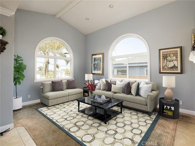 living room with lofted ceiling with beams, baseboards, and tile patterned flooring