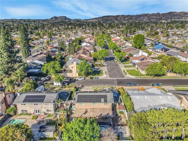 drone / aerial view with a mountain view and a residential view