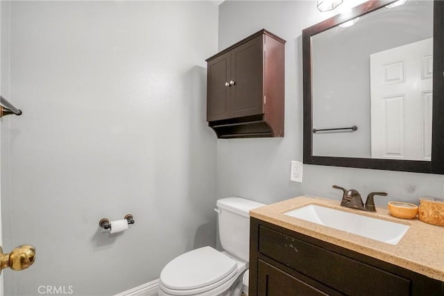 half bath with toilet and vanity