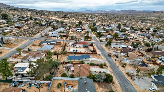 drone / aerial view featuring a mountain view and a residential view