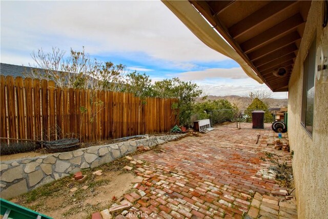 view of patio featuring a fenced backyard