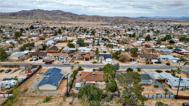 drone / aerial view featuring a mountain view and a residential view