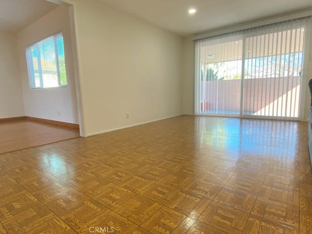 empty room with baseboards