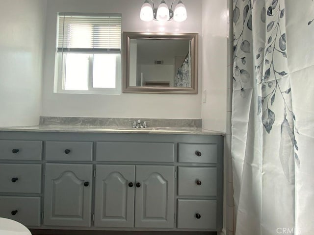 full bathroom featuring vanity