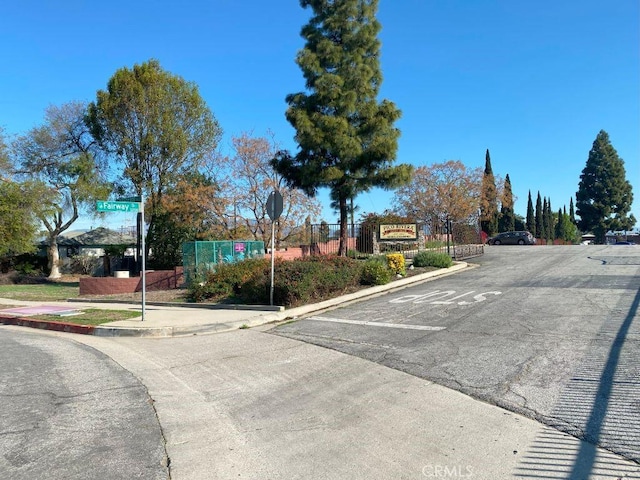 view of street featuring curbs and sidewalks