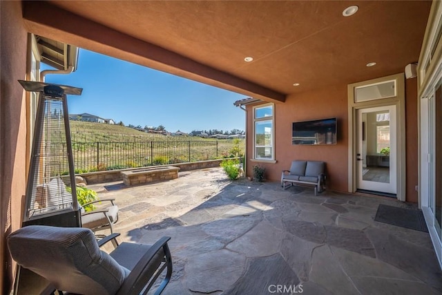 view of patio with fence