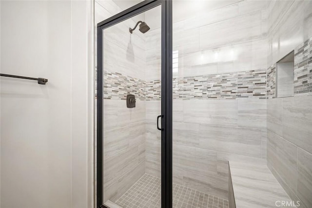 bathroom featuring a stall shower