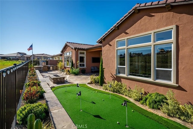 view of yard with a patio and a fenced backyard