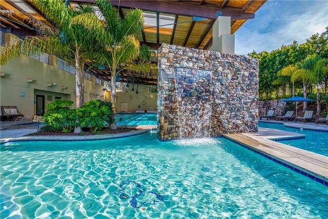 community pool with a patio