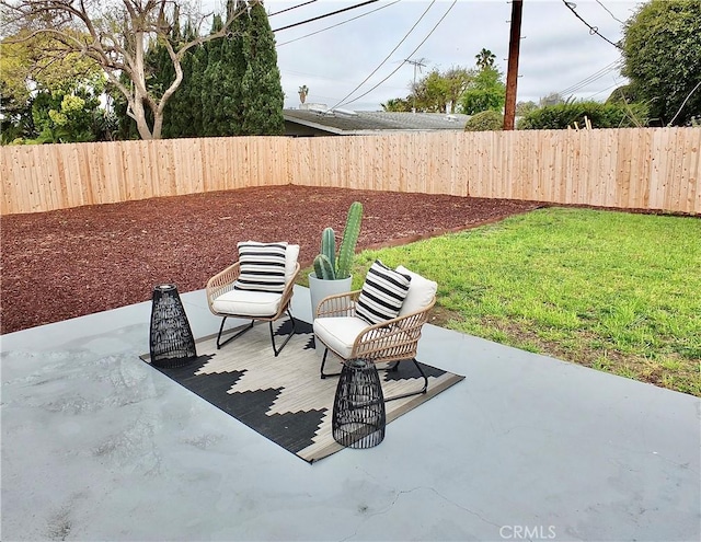 view of patio featuring a fenced backyard