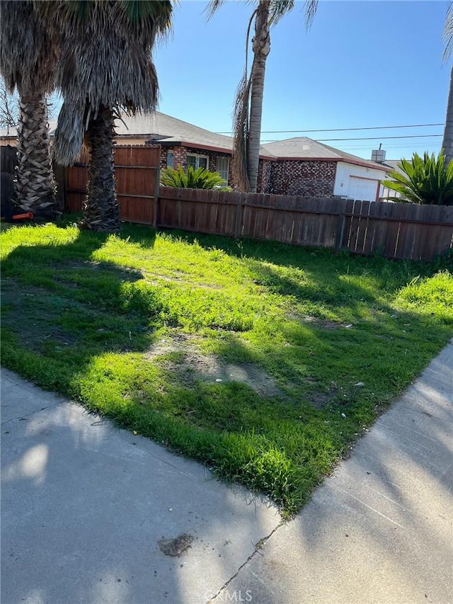 view of yard with fence