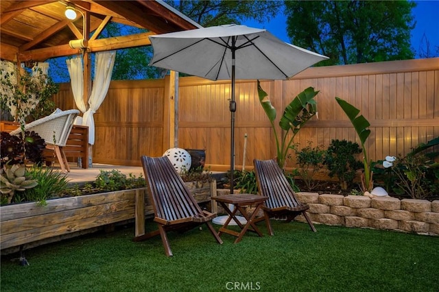 exterior space with a patio and a fenced backyard