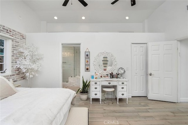 bedroom featuring recessed lighting, connected bathroom, light wood-style floors, and ceiling fan