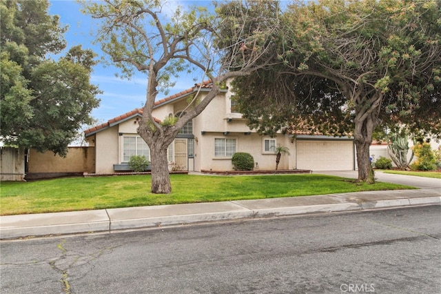 view of front of property featuring stucco siding, concrete driveway, a front yard, and fence