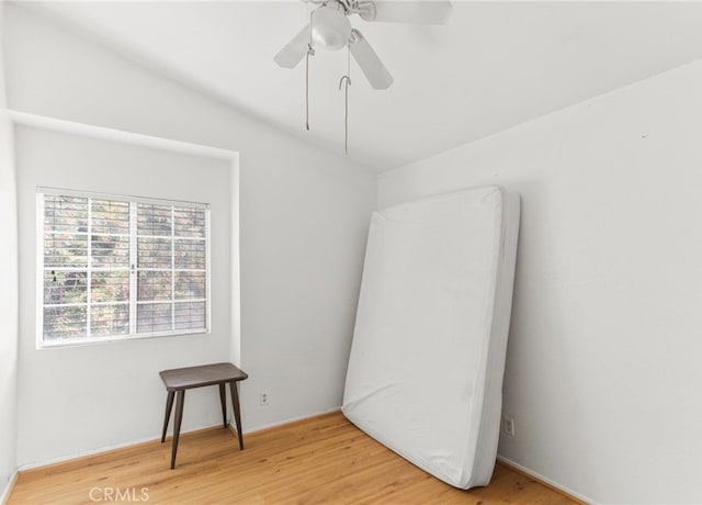 empty room featuring a ceiling fan and light wood-style floors