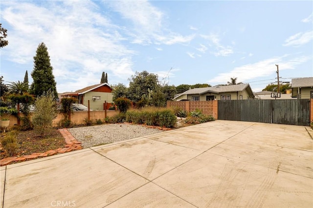 exterior space with a gate and fence