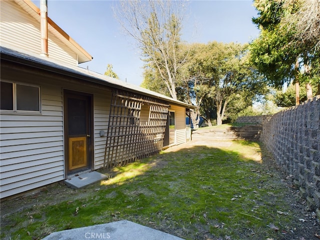 view of yard featuring fence