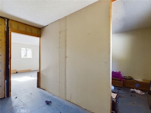 empty room featuring a textured ceiling