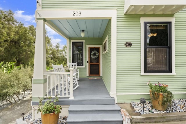 entrance to property with covered porch