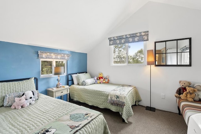 bedroom with carpet and vaulted ceiling