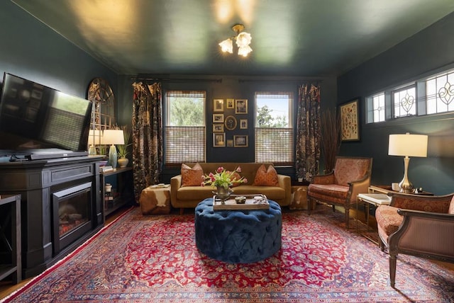 living area featuring a fireplace