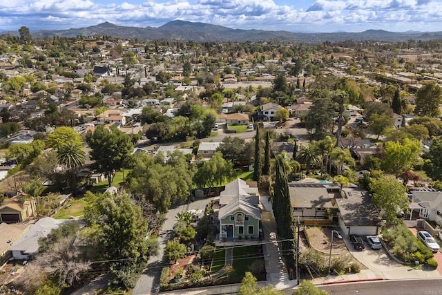 drone / aerial view with a mountain view and a residential view