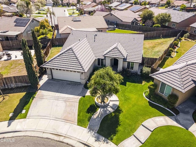 birds eye view of property with a residential view