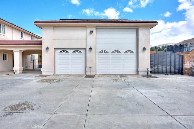 garage featuring a gate