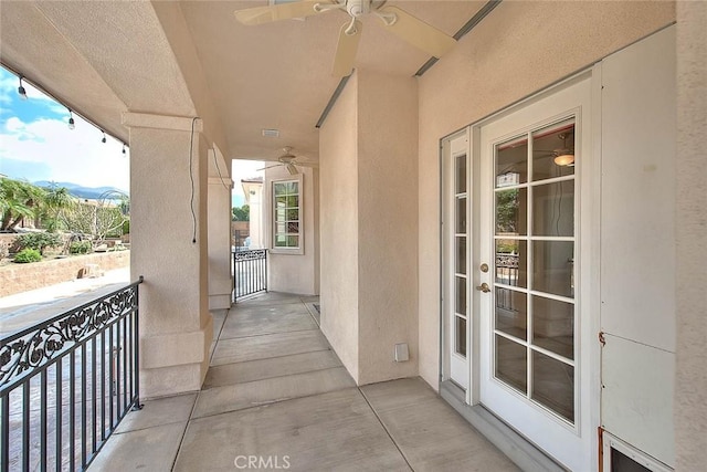 balcony featuring a ceiling fan