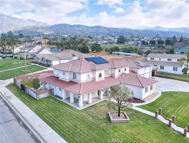 birds eye view of property featuring a residential view and a mountain view