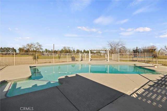 view of swimming pool with a fenced in pool, a pergola, a patio, and fence