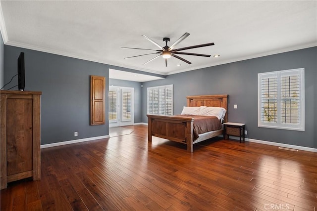 bedroom with dark wood-type flooring, baseboards, and ornamental molding