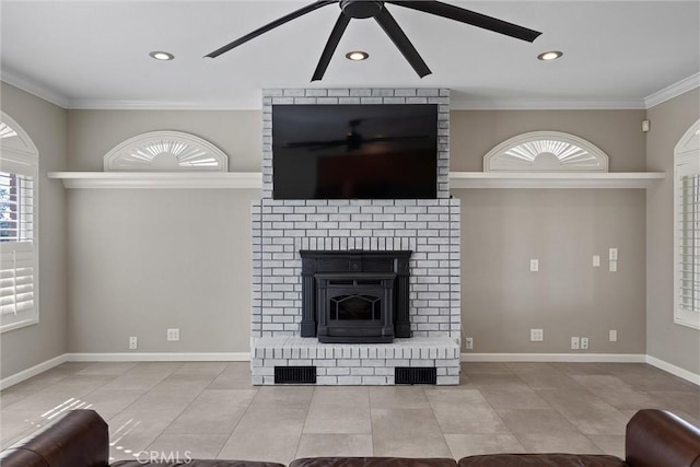 unfurnished living room featuring baseboards, a ceiling fan, a fireplace, and crown molding