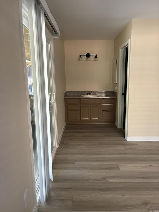 1549 Grand Teton Ct, Chula Vista, CA 91911 - hallway with wood finished floors and healthy amount of natural light