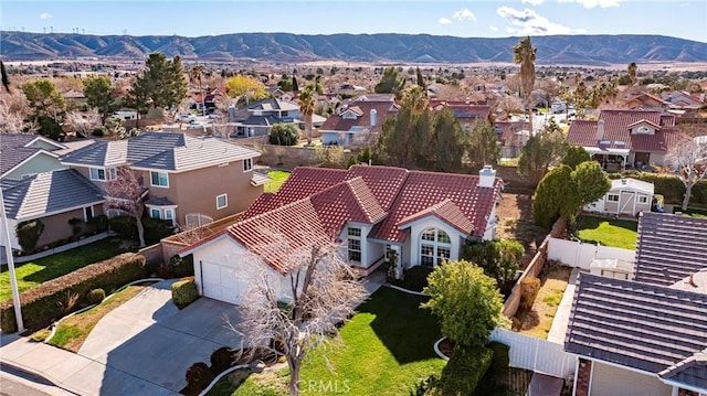 bird's eye view featuring a residential view and a mountain view