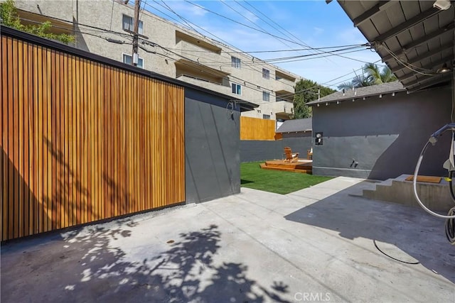 view of patio with fence