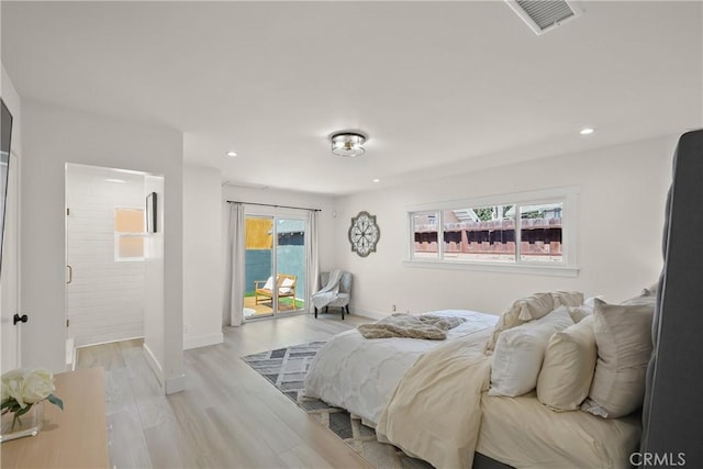 bedroom with access to exterior, visible vents, recessed lighting, and light wood-type flooring