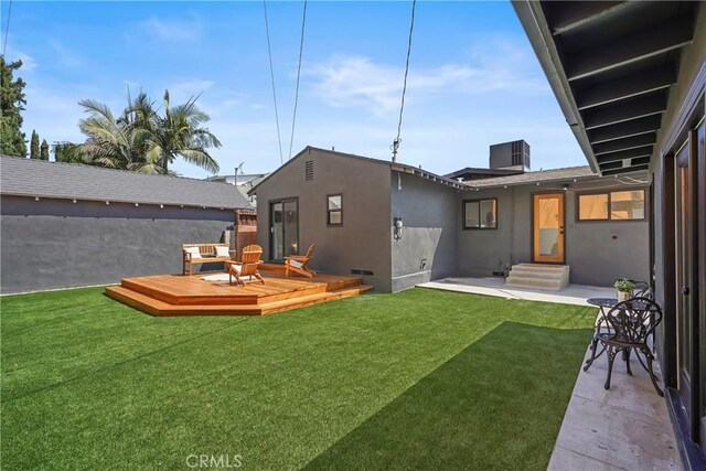 view of yard featuring a deck