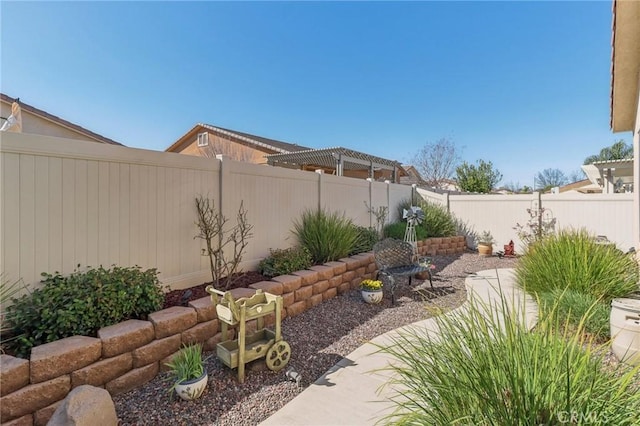 view of yard with a fenced backyard and a pergola