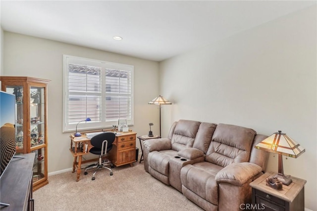 office space featuring recessed lighting, baseboards, and light carpet