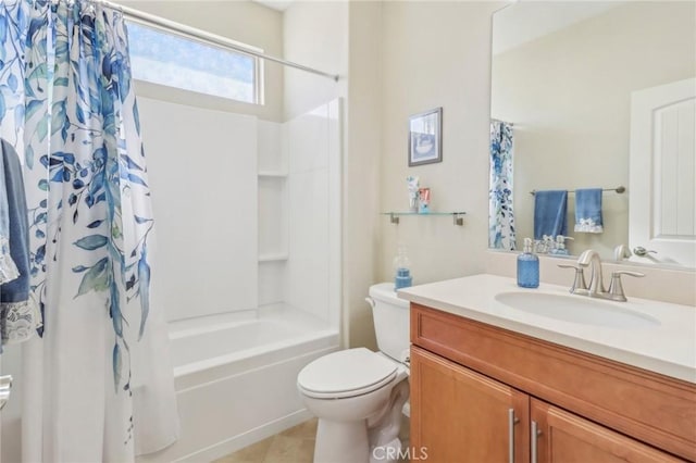 full bath with shower / bath combo with shower curtain, toilet, vanity, and tile patterned flooring