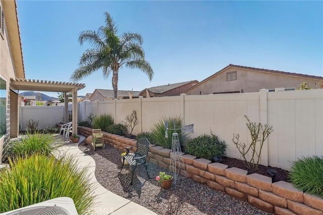 view of yard with a patio and a fenced backyard