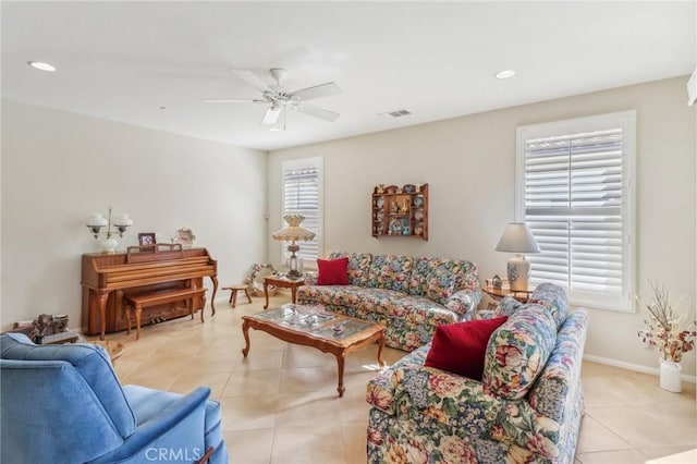 tiled living area featuring a ceiling fan, recessed lighting, baseboards, and visible vents