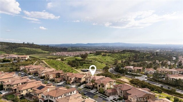 birds eye view of property with a residential view