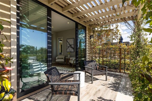 view of patio featuring a pergola