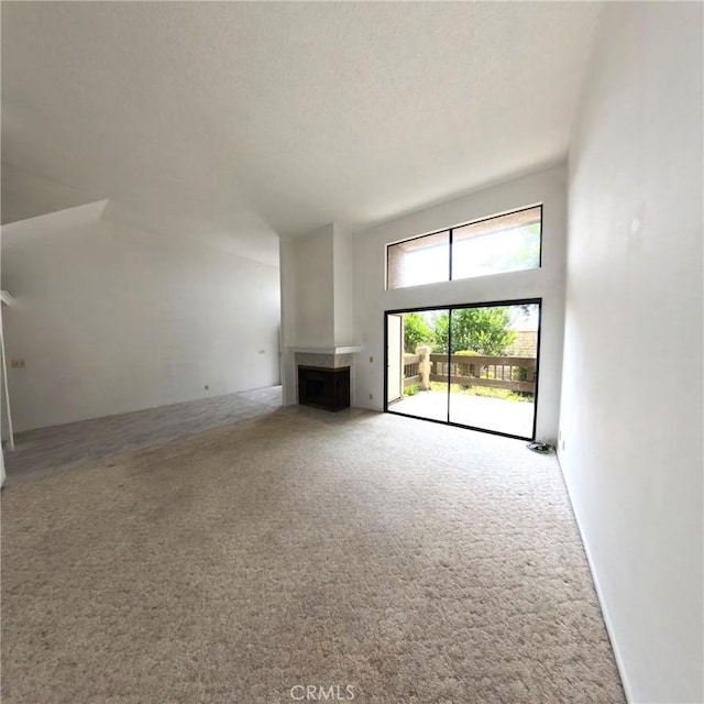 504 Jay Ct, Montebello, CA 90640 - unfurnished living room with carpet and a multi sided fireplace