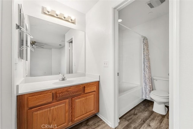 full bathroom with toilet, vanity, shower / bath combo, and wood finished floors